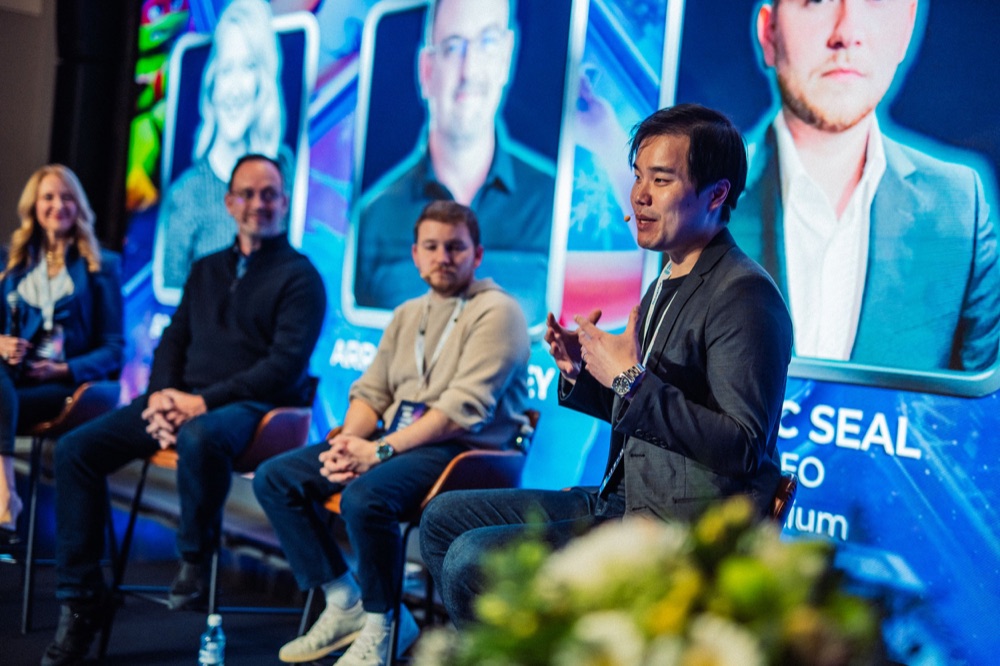 Le Zhang speaking at a conference